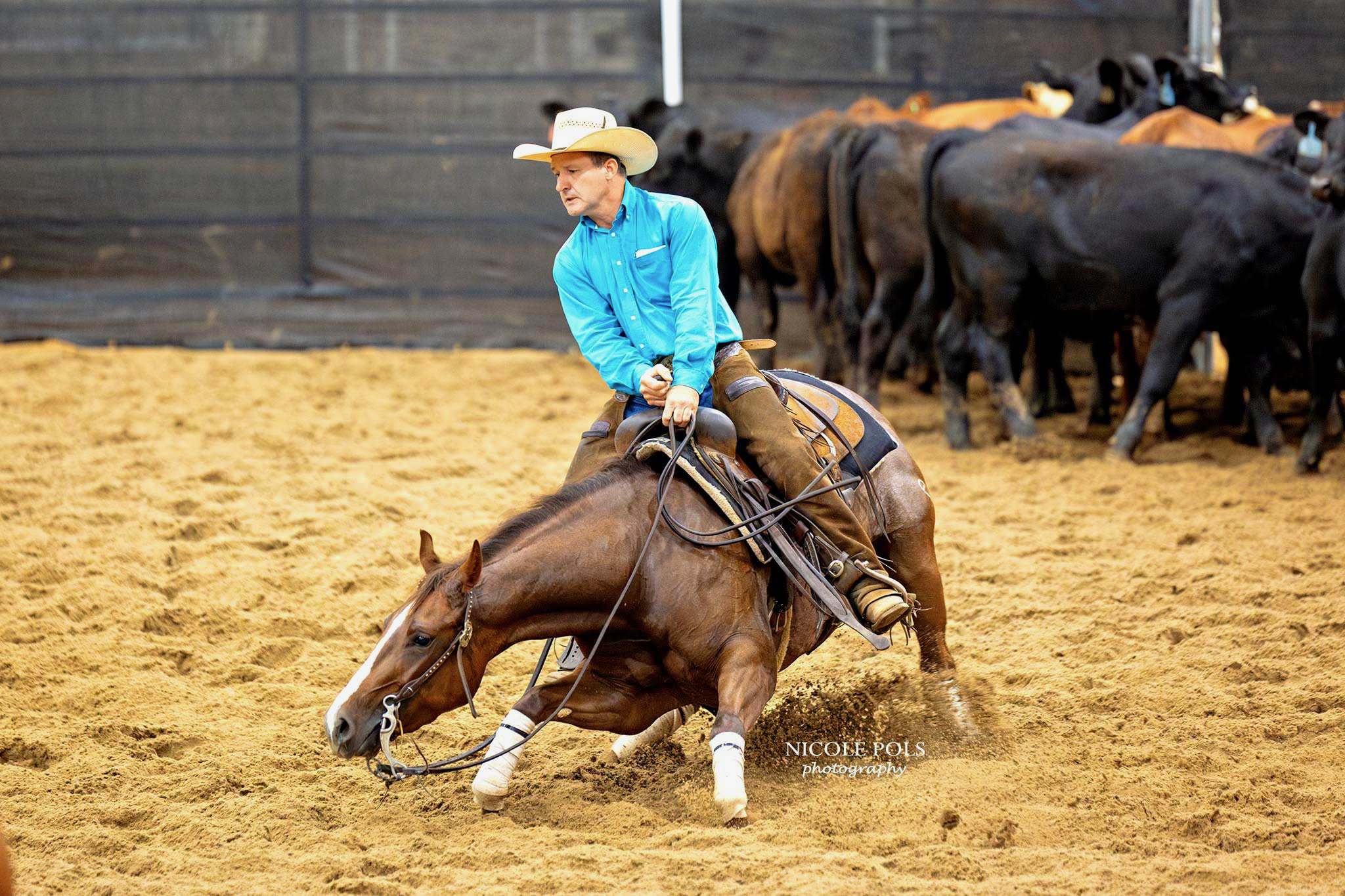 Professional roping coach demonstrating technique